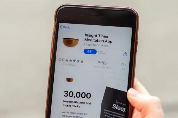 Enhancing Mindfulness on the Move with a Walking Meditation App